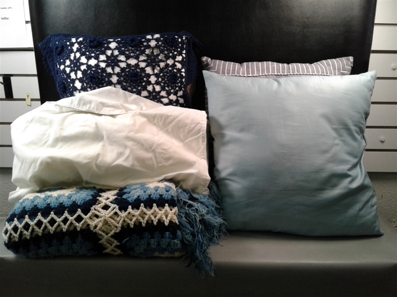 13 Pillows And A Blue Blanket 