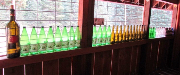 LARGE COLLECTION OF GLASS BOTTLES, GROWLERS & BOTTLE CUTTER TOOL