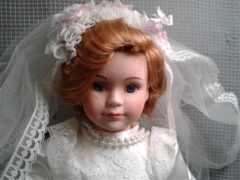 Pair of Porcelain Bride Dolls