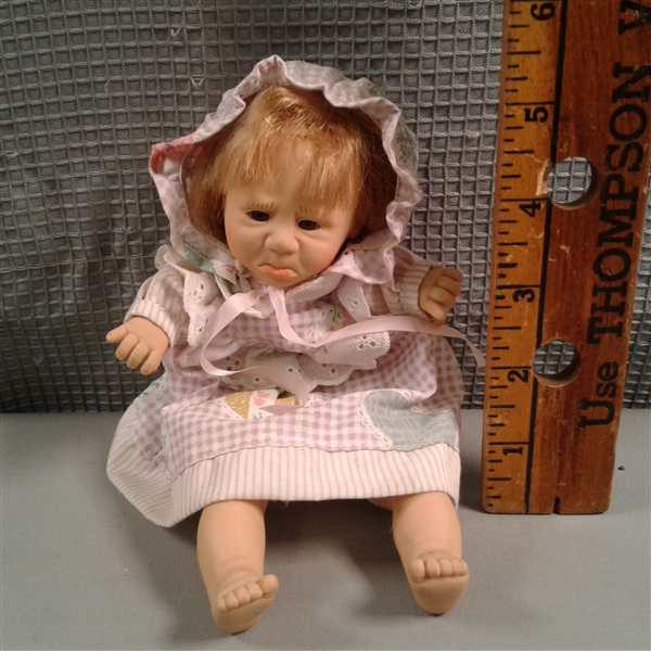 Black Porcelain Doll and 2 Crying Dolls. 