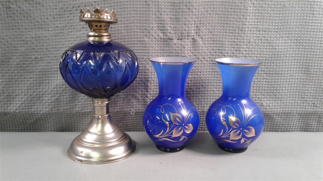 Vintage Cobalt Oil Lamp and Pair of Vases with Gold Trim