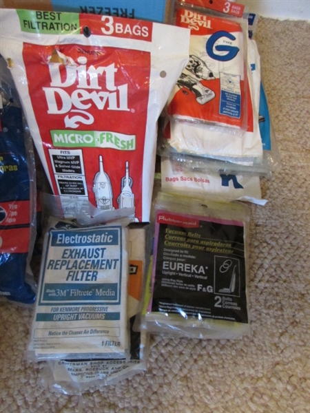 LOTS OF VACUUM CLEANER BAGS AND HOOVER BRUSH ATTACHMENTS