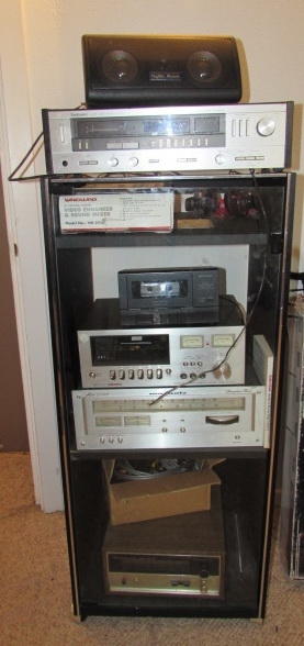 STEREO CABINET WITH ASSORTED STEREO COMPONENTS, HEADPHONES, ETC.