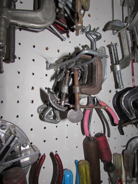 CONTENTS OF PEG WALL - C-CLAMPS AND SCREWDRIVERS