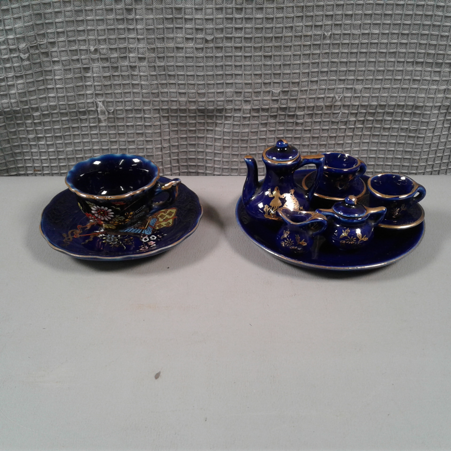 Lot Detail - Cobalt & Gold Miniature Tea Set & Teacup w/Saucer