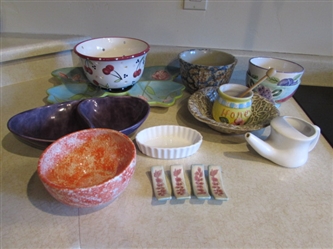 COLORFUL DISPLAY OF KITCHEN BOWLS AND FUN NECESSITIES
