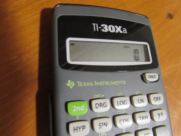 FOUR TEXAS INSTRUMENTS SCIENCE AND MATH CALCULATORS