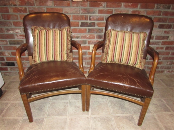 2 VINTAGE LEATHER/WALNUT ARMY ARM CHAIRS WITH THROW PILLOWS