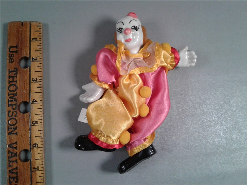 Collection of Porcelain Dolls and Clowns