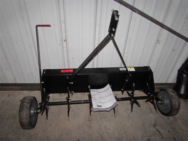 BRINLY-HARDY 40” TOW-BEHIND PLUG AERATOR WITH WEIGHT TRAY AND UNIVERSAL HITCH