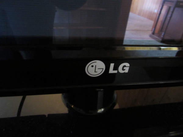 42 LG FLAT SCREEN PLASMA TV W/STAND