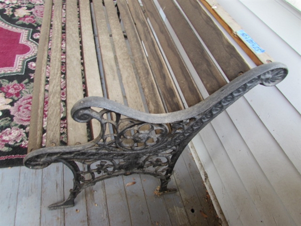 Outdoor Cast Iron and Wood Bench. In good condition.