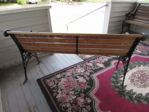 Outdoor Cast Iron and Wood Bench. In good condition.