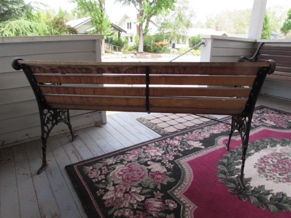 Outdoor Cast Iron and Wood Bench. In good condition.