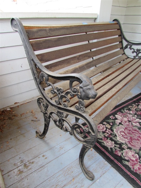 Outdoor Cast Iron and Wood Bench. In good condition.