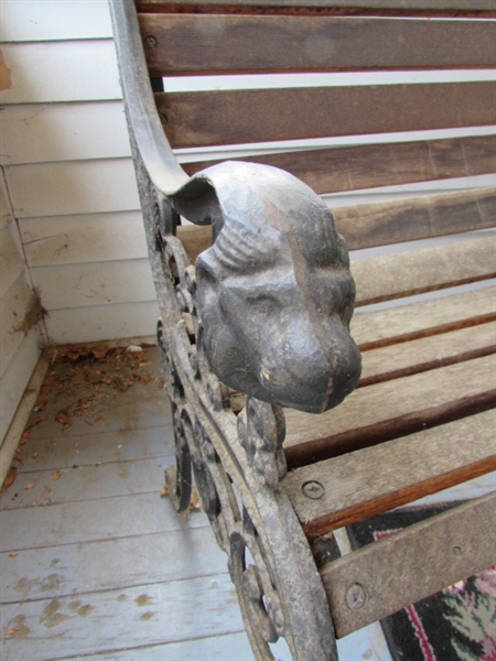 Outdoor Cast Iron and Wood Bench. In good condition.