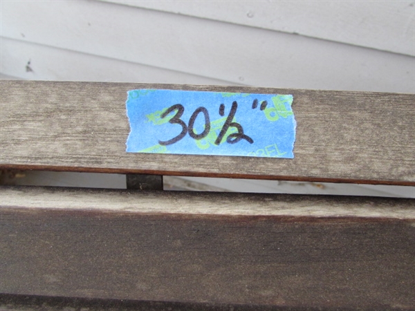 Outdoor Cast Iron and Wood Bench. In good condition.