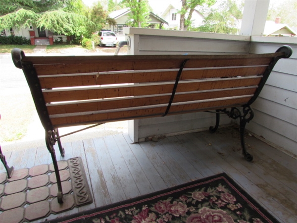 Outdoor Cast Iron and Wood Bench. In good condition.