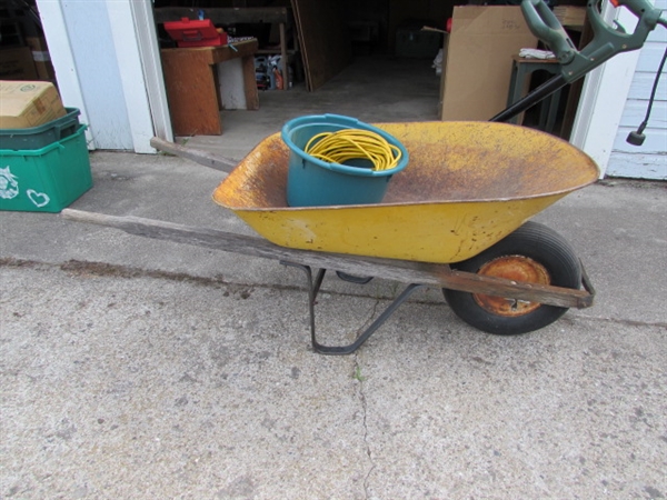 Edge Hog, Extension Cord, and Metal Wheelbarrow