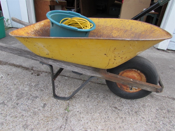 Edge Hog, Extension Cord, and Metal Wheelbarrow