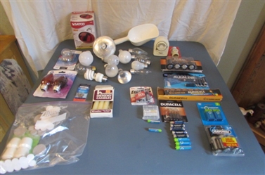 Various Light Bulbs, Batteries, and Household Items