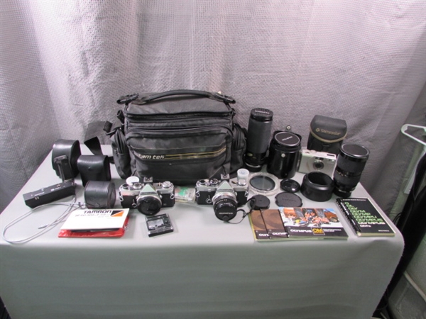 Vintage Olympus 35mm Cameras, Various Lenses, and Accessories in Bag