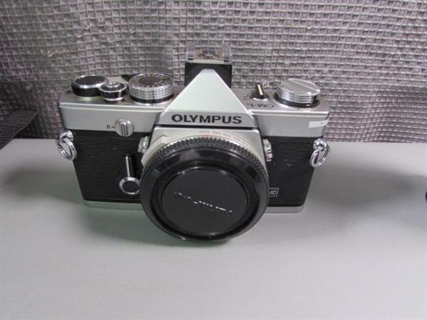 Vintage Olympus 35mm Cameras, Various Lenses, and Accessories in Bag