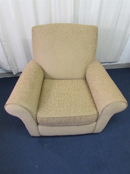BEIGE UPHOLSTERED ROCKING CHAIR