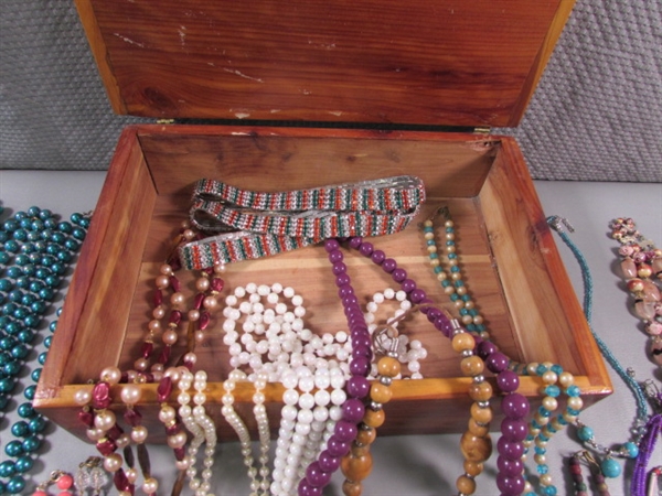 WOODEN BOX FULL OF NECKLACES