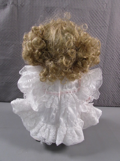 Lot Detail - PORCELAIN KNEELING DOLL