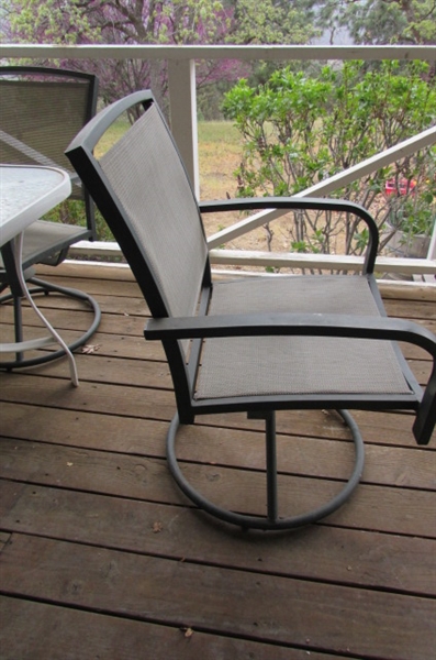 WHITE PATIO TABLE & FOUR SWIVEL PATIO CHAIRS