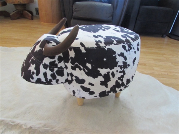 LARGE WHITE ANIMAL HIDE AND LITTLE COW FOOTSTOOL.