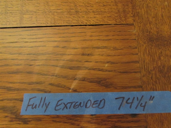 ANTIQUE WOOD TABLE THAT EXTENDS AND ANTIQUE CHAIR