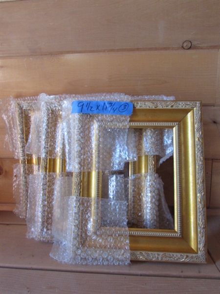 9 GOLD FRAMES OF DIFFERENT SHAPES AND SIZES