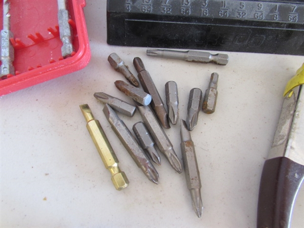 CLAMPS AND DRILL BITS