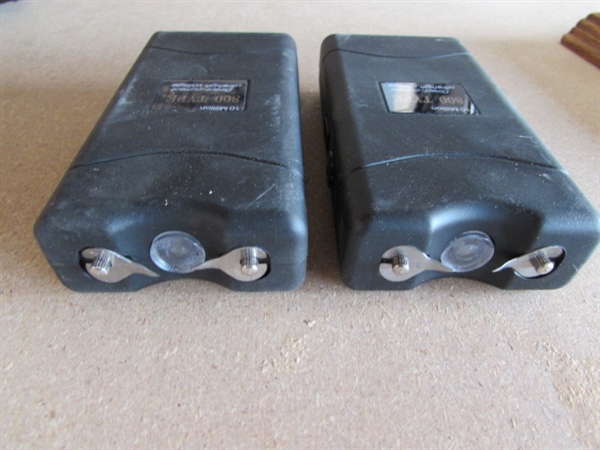2 STUN GUNS AND GRENADE WALL HOOK