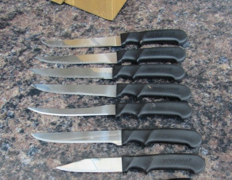 2 SETS OF KNIVES IN BLOCKS
