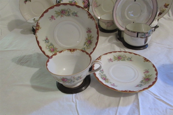 ASSORTED TEA CUPS AND SAUCERS