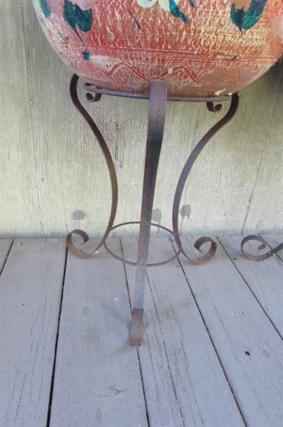 PAIR OF WROUGHT IRON PLANT STANDS WITH CLAY PLANTERS