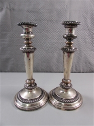 PAIR OF WEIGHTED SILVERPLATE CANDLESTICKS