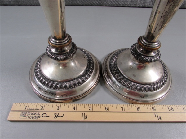 PAIR OF WEIGHTED SILVERPLATE CANDLESTICKS