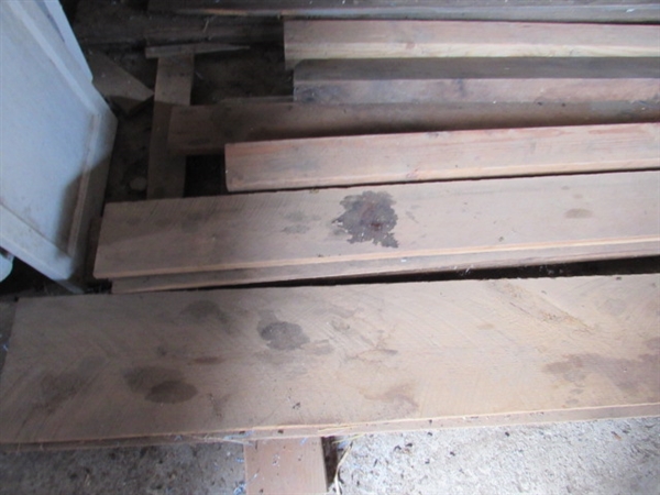 LARGE PIECES OF LUMBER AND WOOD SCRAP