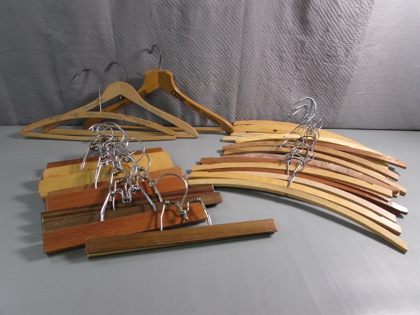 ASSORTED WOODEN HANGERS-A FEW WITH STAMPED LOCATIONS