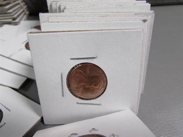 LARGE COLLECTION OF US PENNIES IN CARDBOARD PROTECTORS