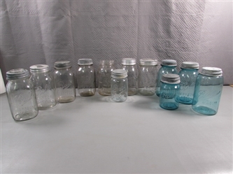 A DOZEN VTG/ANTIQUE GLASS CANNING JARS W/ZINC & GLASS TOPS