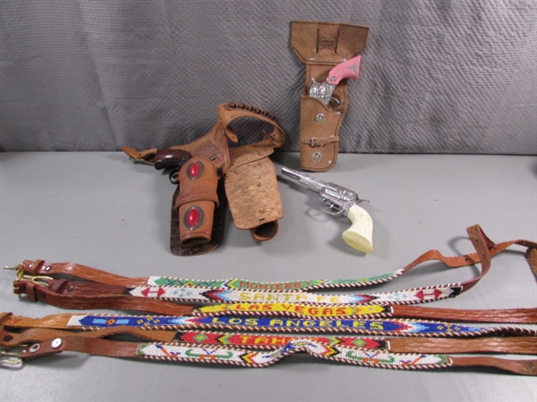 CHILDS TOY GUNS, DAISY BB GUN, HOLSTERS AND BEADED LEATHER BELTS