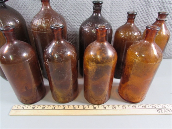 ASSORTED SIZES OF VINTAGE BLEACH/CLOROX BROWN GLASS BOTTLES