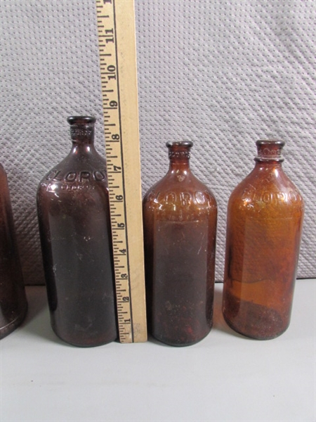 ASSORTED SIZES OF VINTAGE BLEACH/CLOROX BROWN GLASS BOTTLES