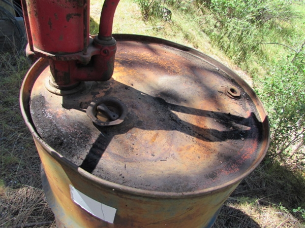 55 GALLON OIL DRUM WITH VINTAGE HAND CRANK PUMP