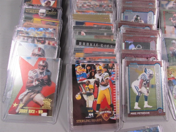 COLLECTION OF FOOTBALL TRADING CARDS IN HARD COVERS